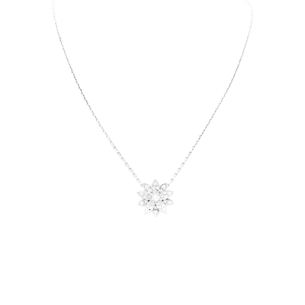 Pendentif Van Cleef & Arpels, "Lotus", or blanc et diamants.