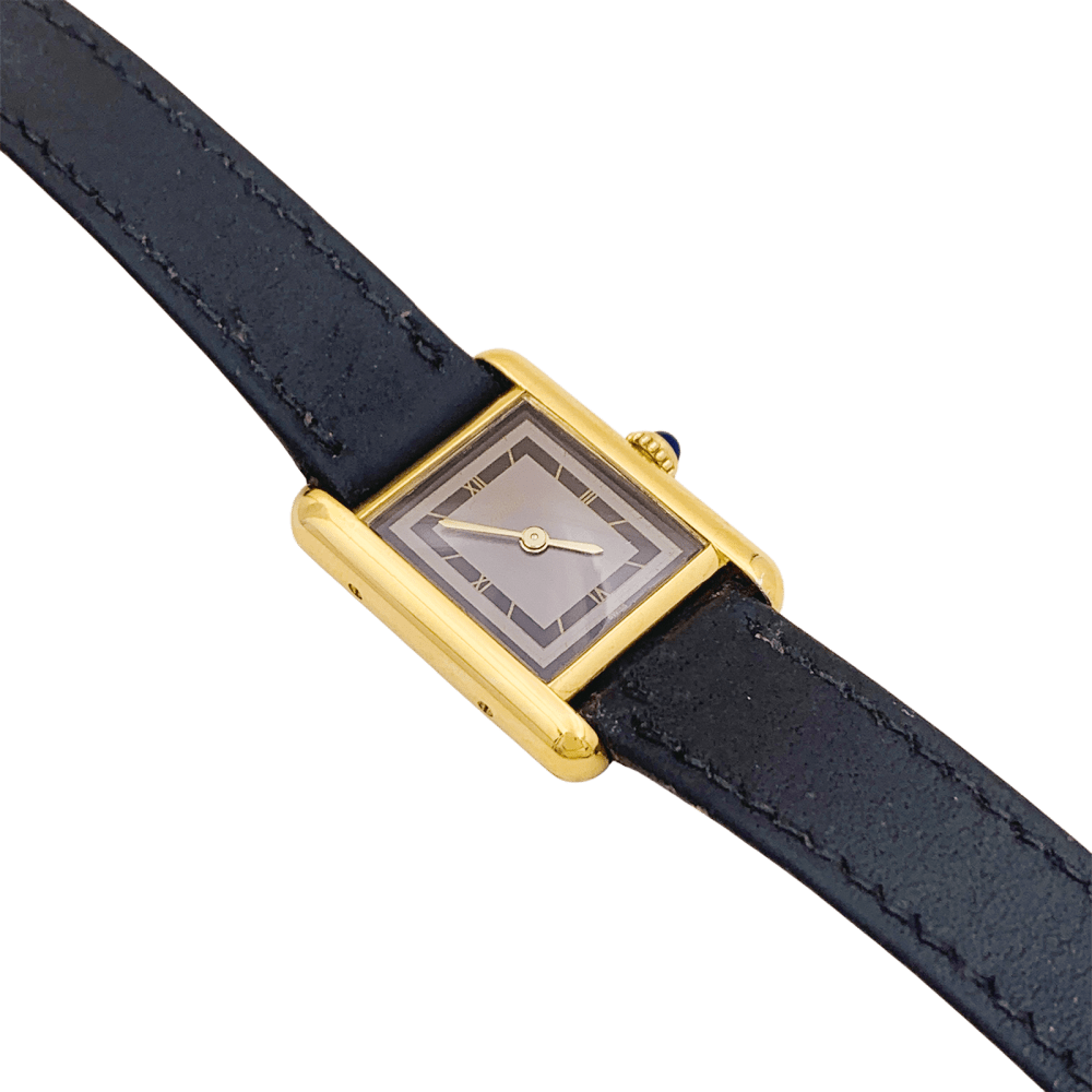 Montre Cartier, "Tank Must", argent plaqué or, cuir.