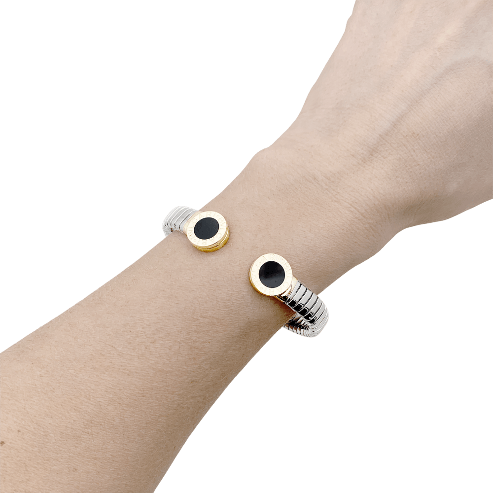 Bracelet-Bulgari-vintage-Bulgari-Bulgari-acier-or jaune-onyx-maison-eloe