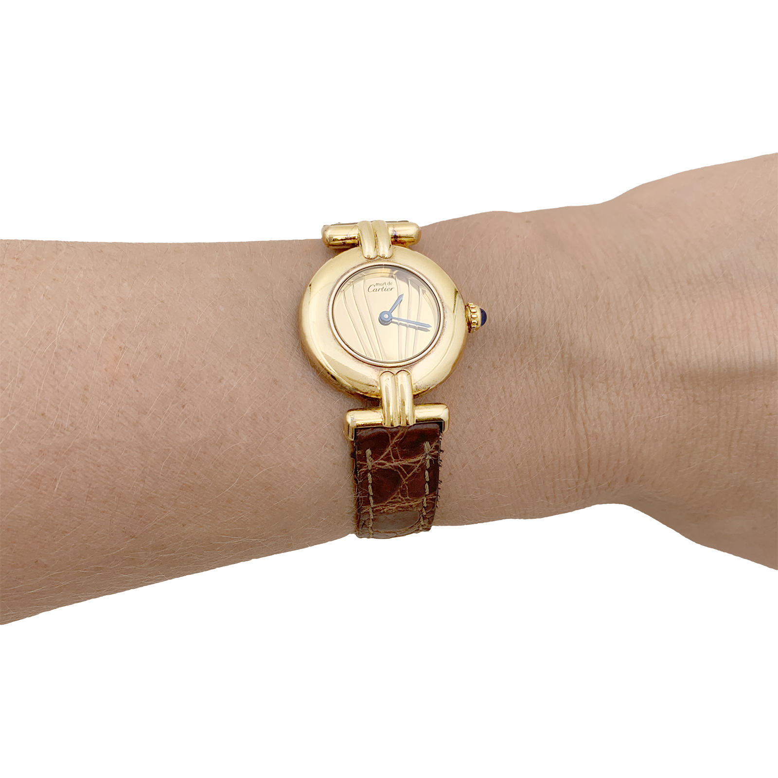 Montre Cartier, "Colisée Must", vermeil, cuir.