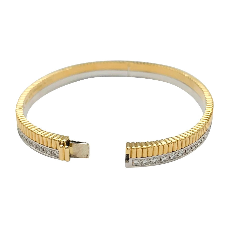 Boucheron bracelet, "Quatre Radiant", in yellow and white gold and diamonds.