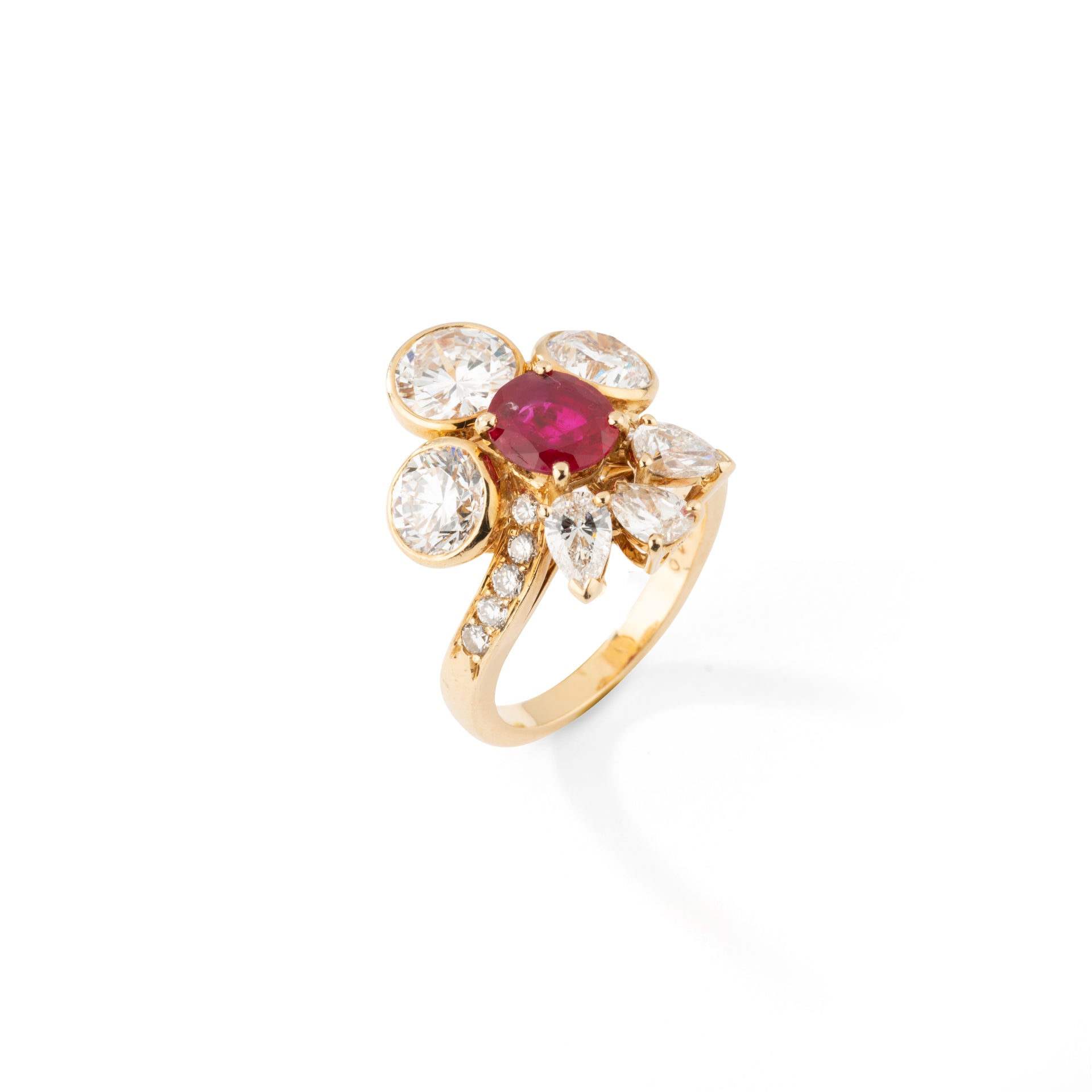 Yellow gold ring adorned with a natural Burmese Ruby and diamonds, signed MELLERIO