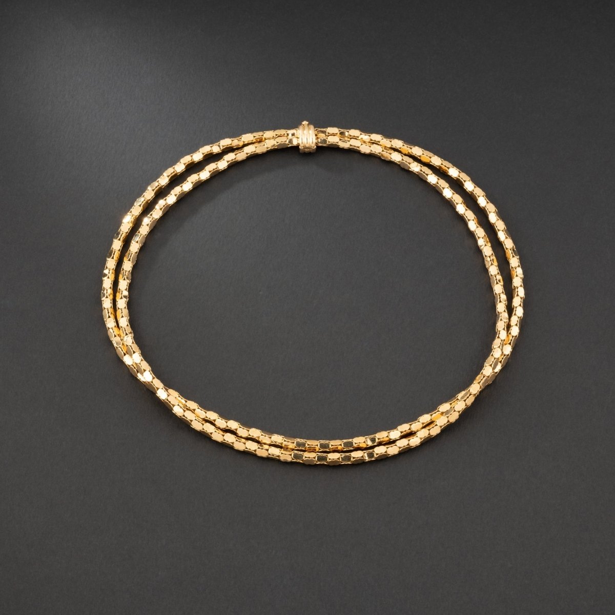Collier en or jaune 18K à deux rangs, signé MELLERIO. - Maison Eloe