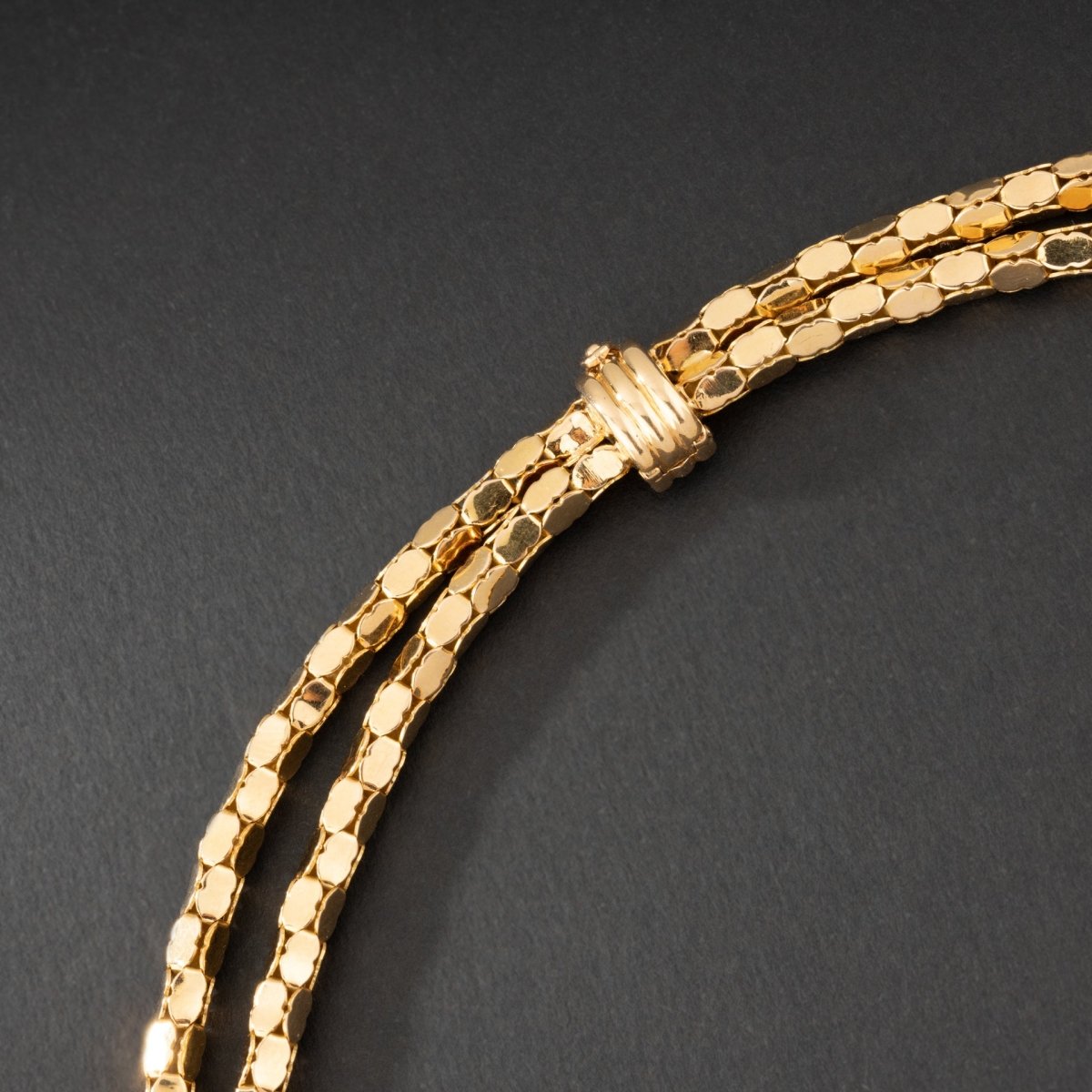 Collier en or jaune 18K à deux rangs, signé MELLERIO. - Maison Eloe