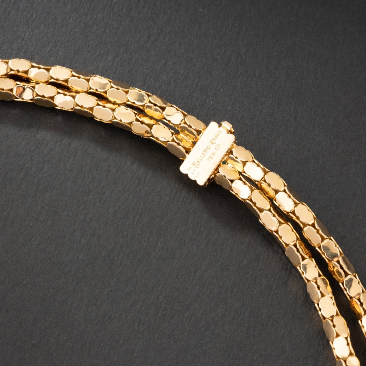 Collier en or jaune 18K à deux rangs, signé MELLERIO. - Maison Eloe