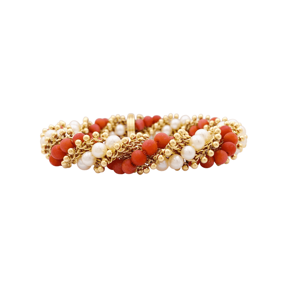 Bracelet Van Cleef & Arpels, "Twist", or jaune, corail, perles.