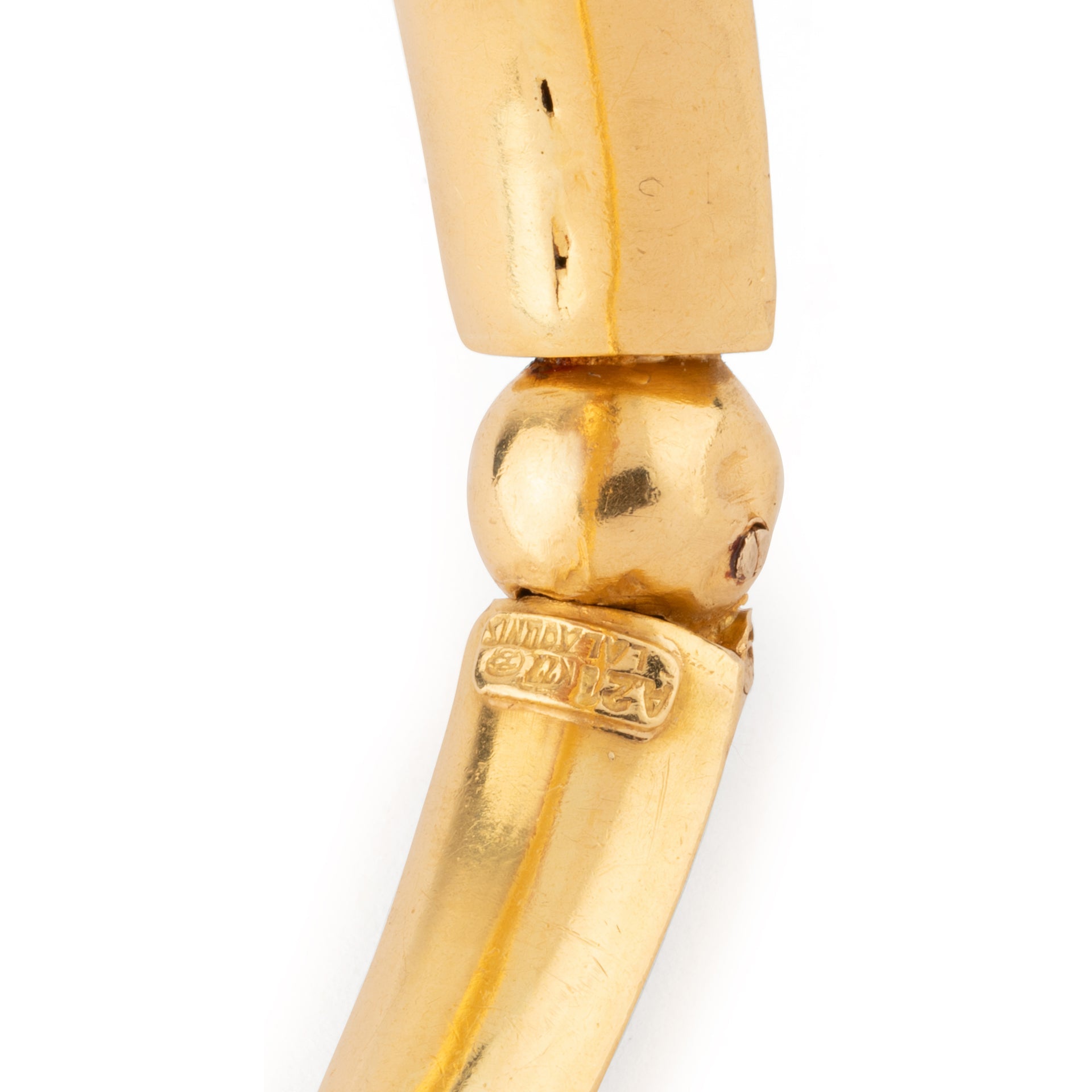 22k hammered yellow gold bangle bracelet by designer Lalaounis
