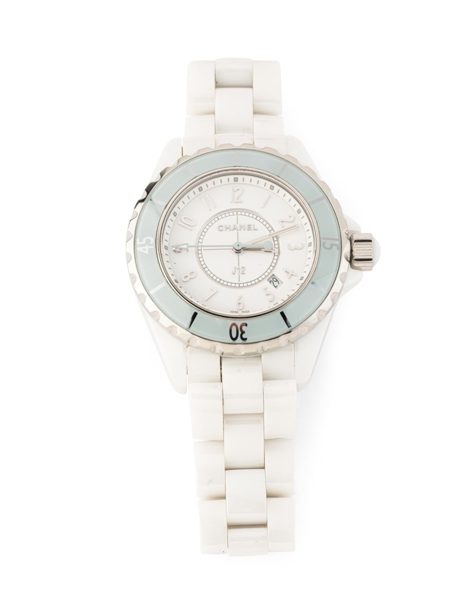 Montre Chanel J12 Edition limitée Lunette Bleue céramique blanche - Maison Eloe