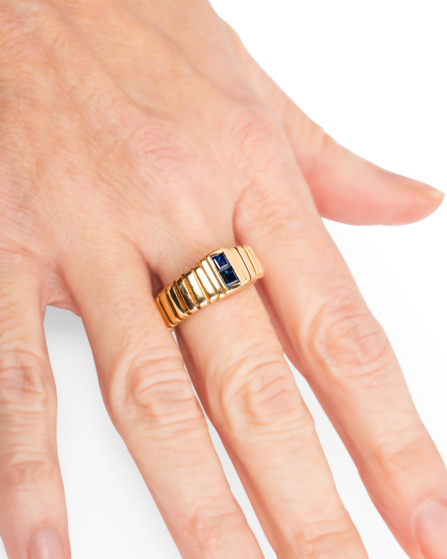 Bague Bulgari vintage maille Tubogas Or jaune et Saphir