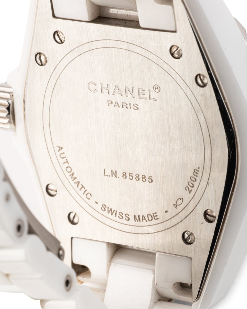 Montre Chanel J12 lunette Diamants Céramique Blanche - Maison Eloe