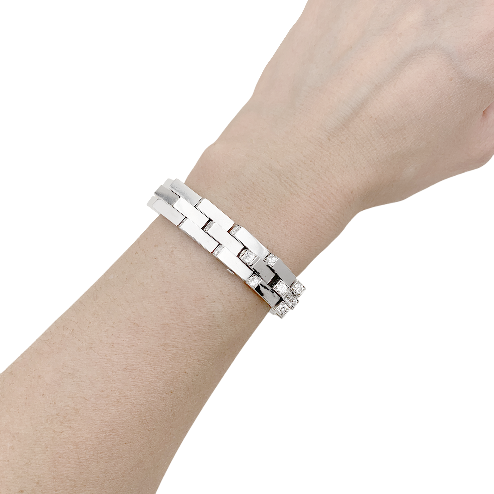 Bracelet Vintage Boucheron, "Crémaillère", platine, diamants.