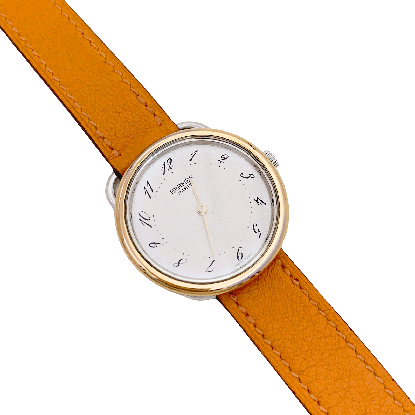 Montre Hermès, "Arceau", plaqué or, acier, cuir.