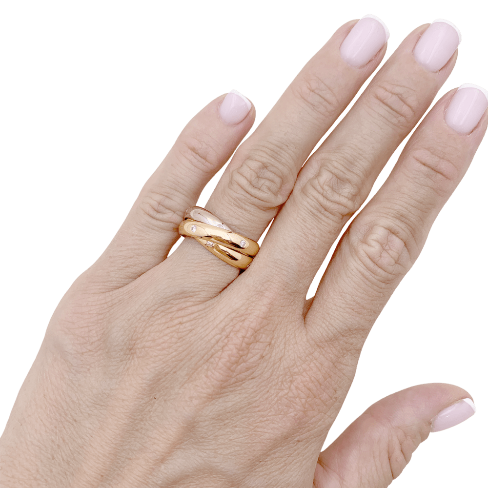 Bague Cartier, "Constellation", trois ors et diamants.