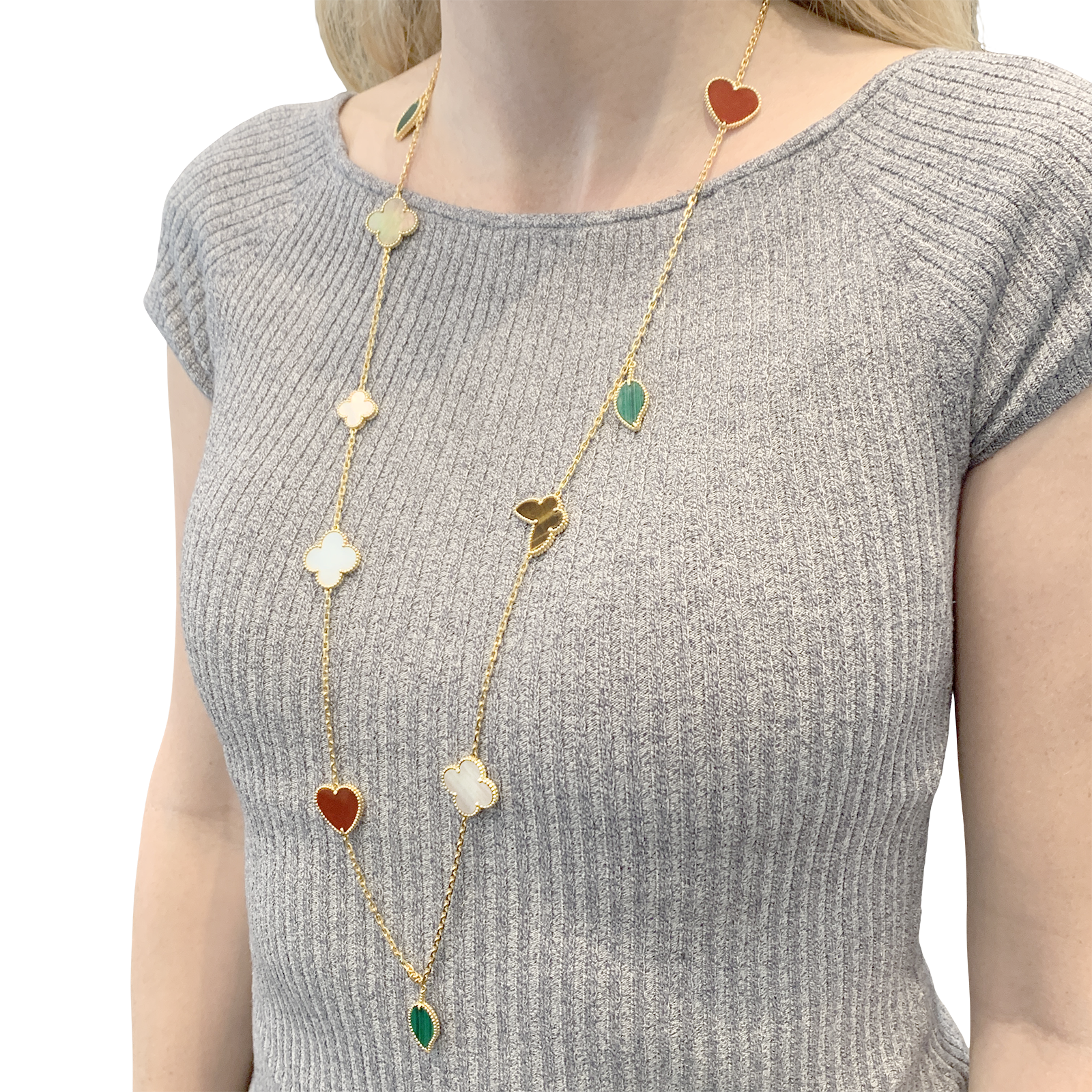 Collier-Sautoir Van Cleef & Arpels, "Lucky Alhambra", or jaune, cornaline, malachite, oeil de tigre, nacre.