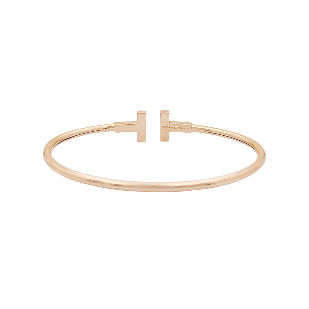 Bracelet Tiffany & Co, "Wire Tiffany T", or rose et diamants.
