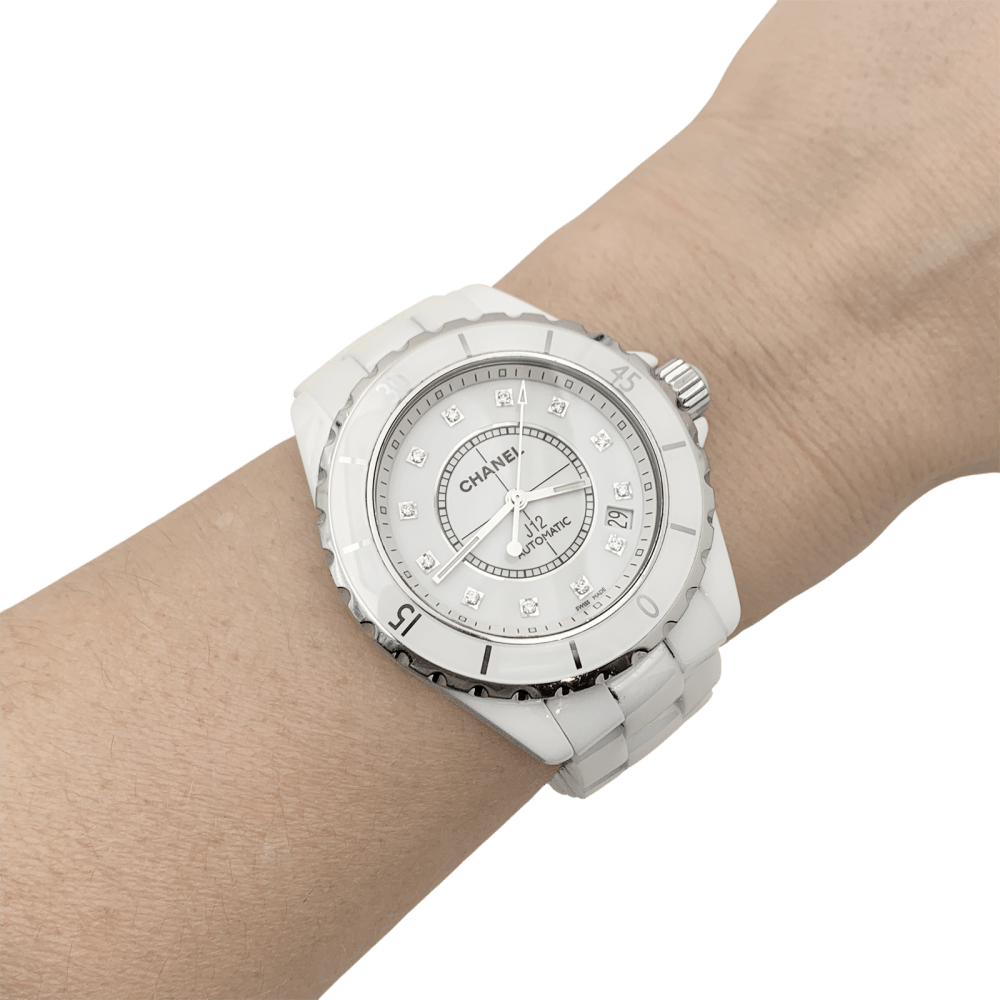 Montre Chanel, "J12", céramique blanche, diamants.
