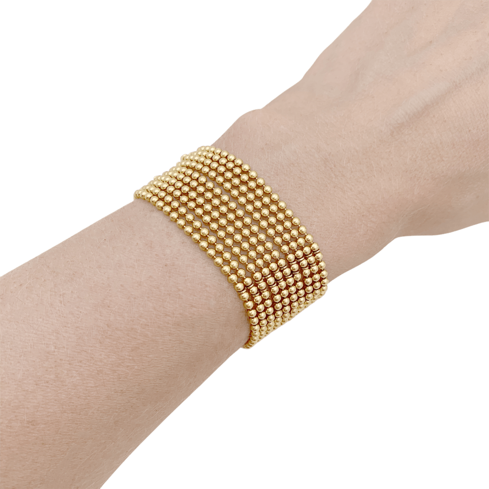 Bracelet Cartier modèle Draperie en or jaune.