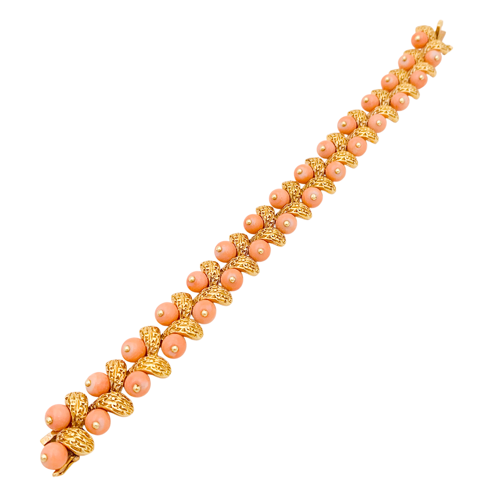 Bracelet Van Cleef & Arpels, “Gui”, or jaune, corail peau d’ange.