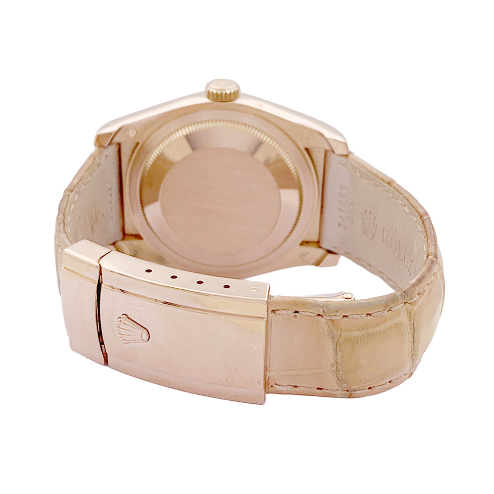 Montre Rolex, "Datejust" or rose, diamants, cuir.