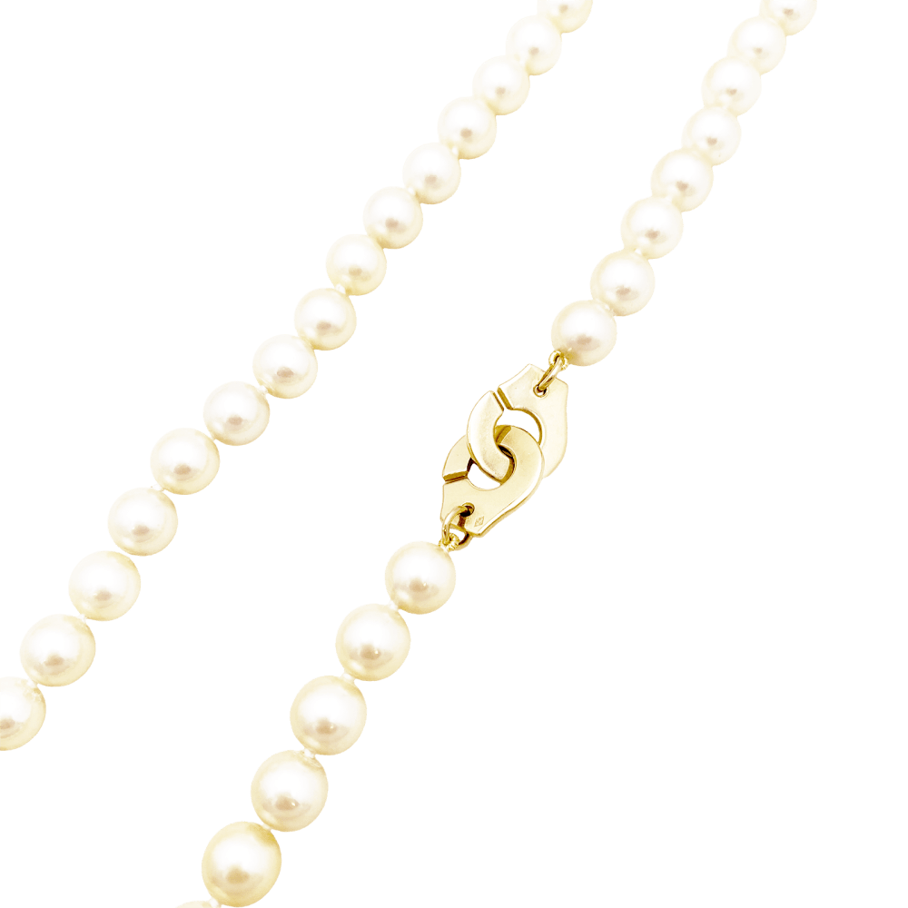 Collier de perles Dinh Van, "Menottes R12", en or jaune.