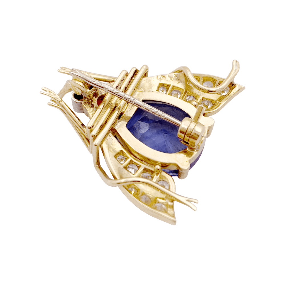 Broche Van Cleef & Arpels, « Abeille », platine, or jaune, saphir, rubis et diamants.