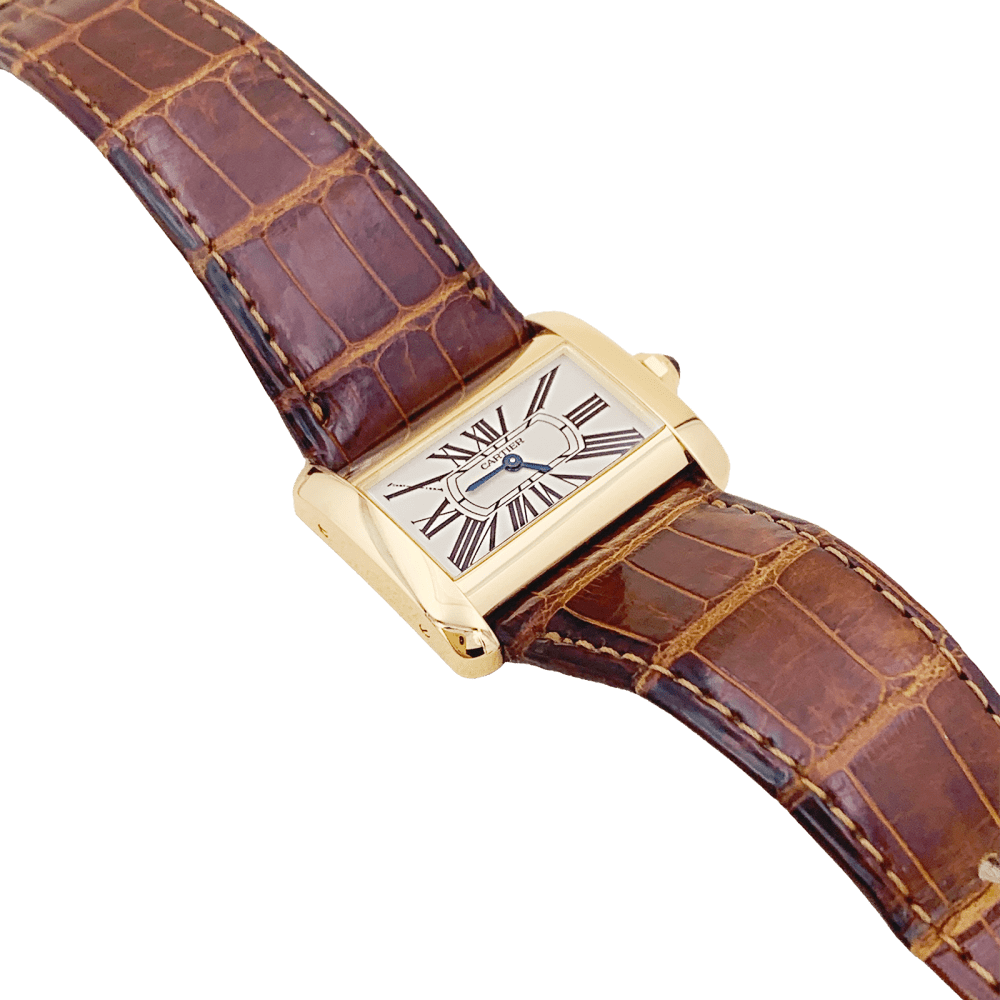 Montre Cartier, "Divan", or jaune, cuir.