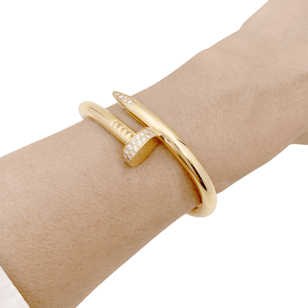 Bracelet Cartier, "Juste un clou", or jaune, diamants.