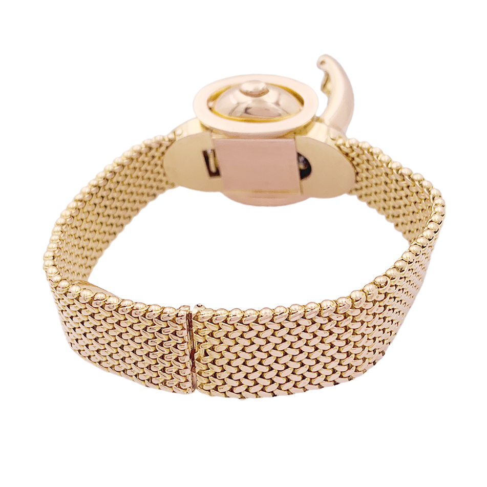 Montre vintage secrète, or rose.