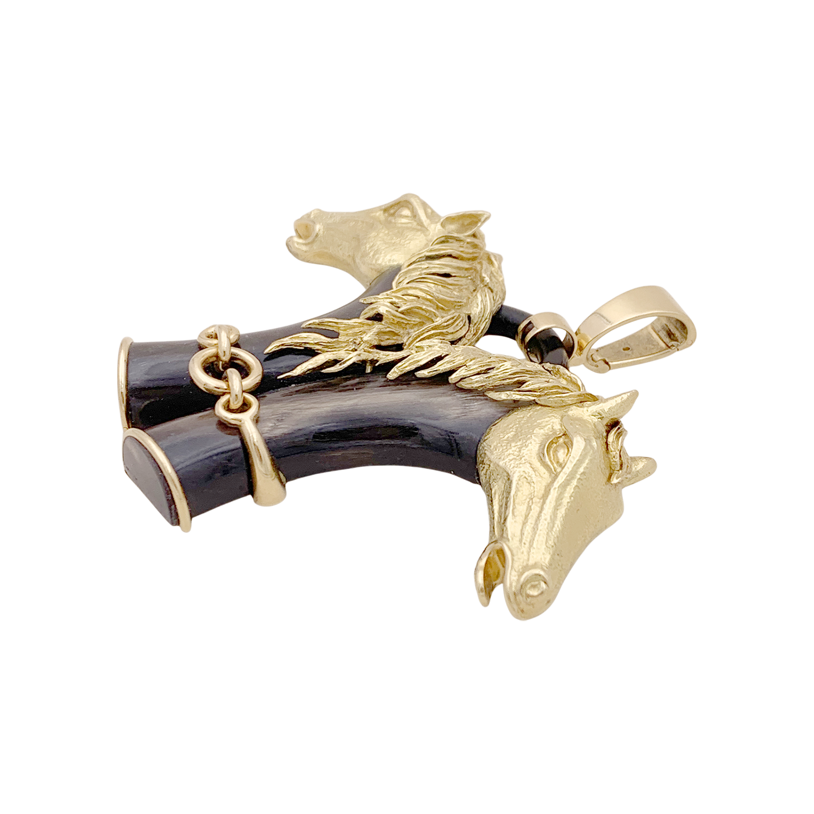 Pendentif FRED double tête de cheval en or jaune et corne.