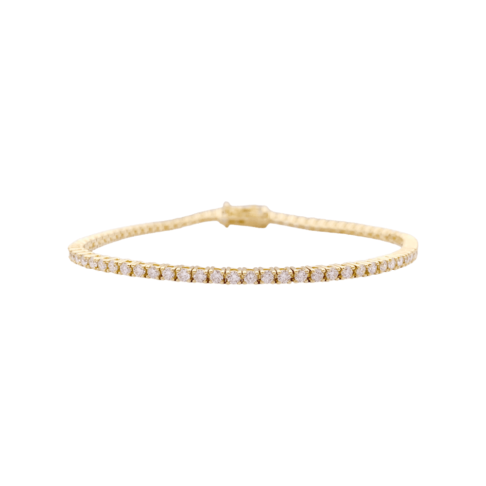 Bracelet ligne, or jaune et diamants.