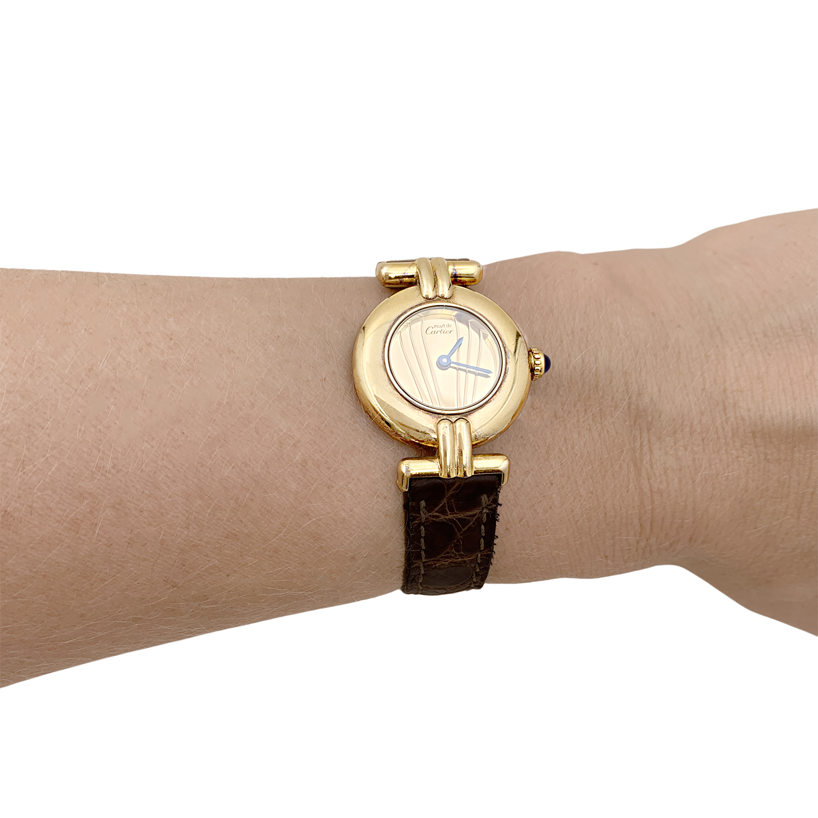 Montre Cartier, "Colisée Must", vermeil, cuir.