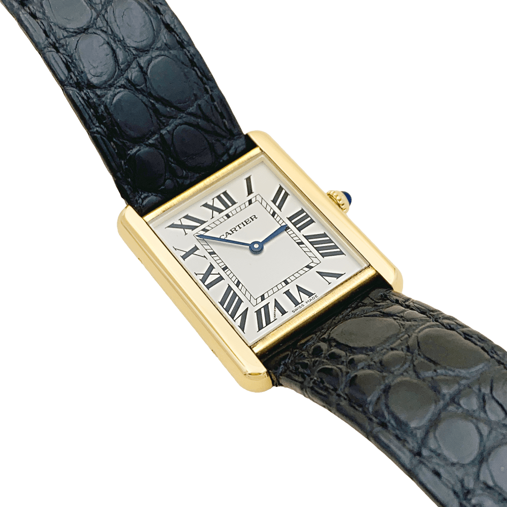 Montre Cartier, "Tank Solo", or jaune et acier.