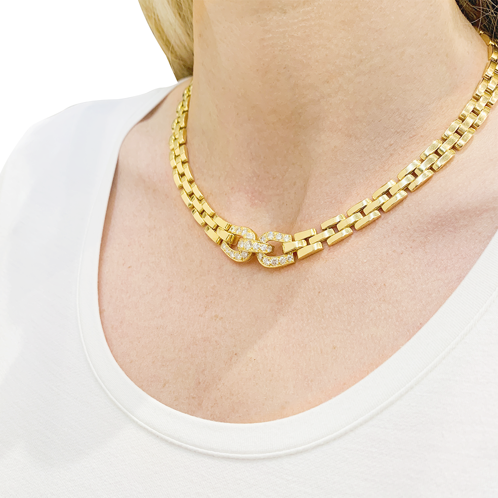 Collier Cartier, "Etrier", or jaune, diamants.