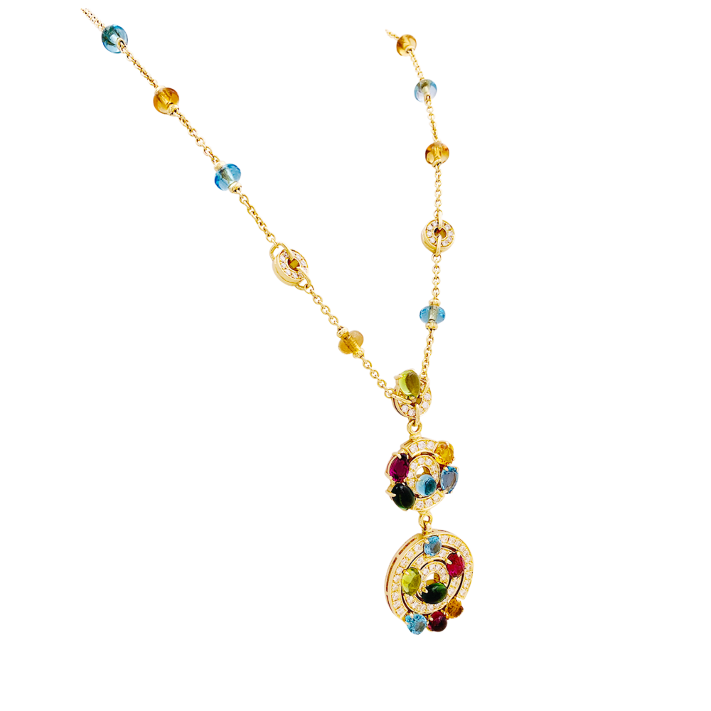 Collier BULGARI "Astrale", or jaune, diamants et pierres de couleur.