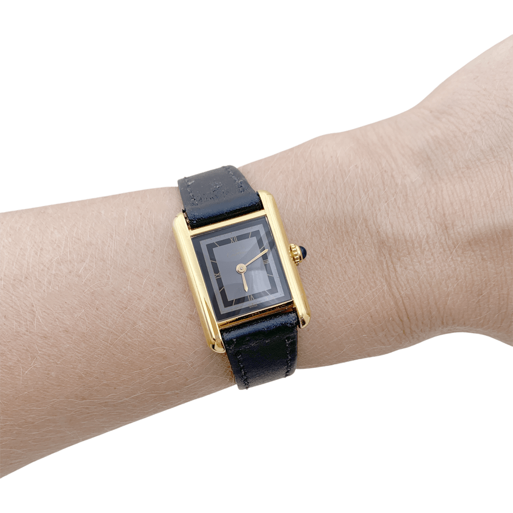 Montre Cartier, "Tank Must", argent plaqué or, cuir.
