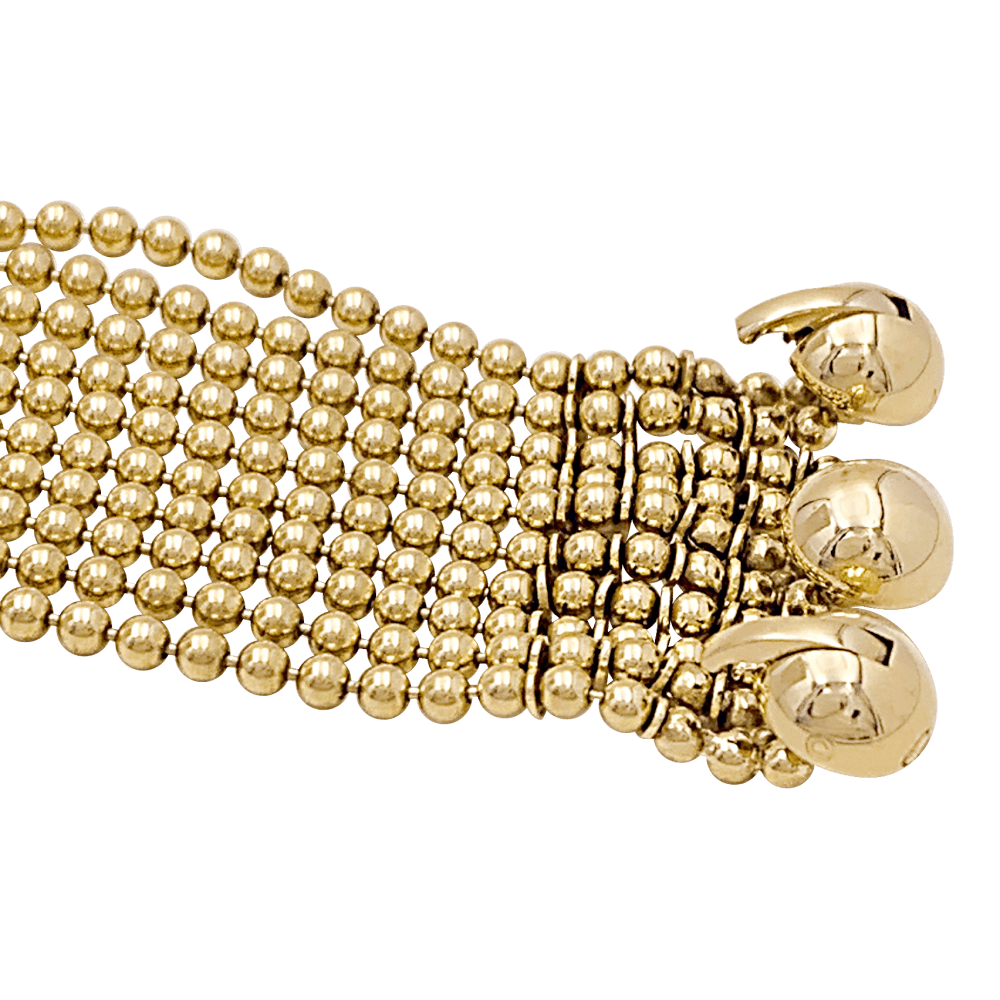 Bracelet Cartier modèle Draperie en or jaune.