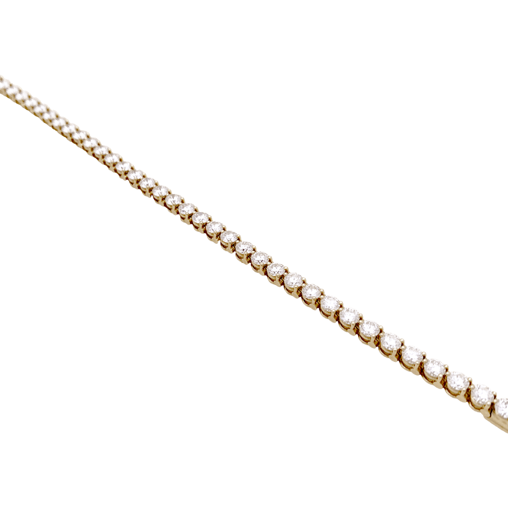 Bracelet ligne Cartier, or jaune et diamants.