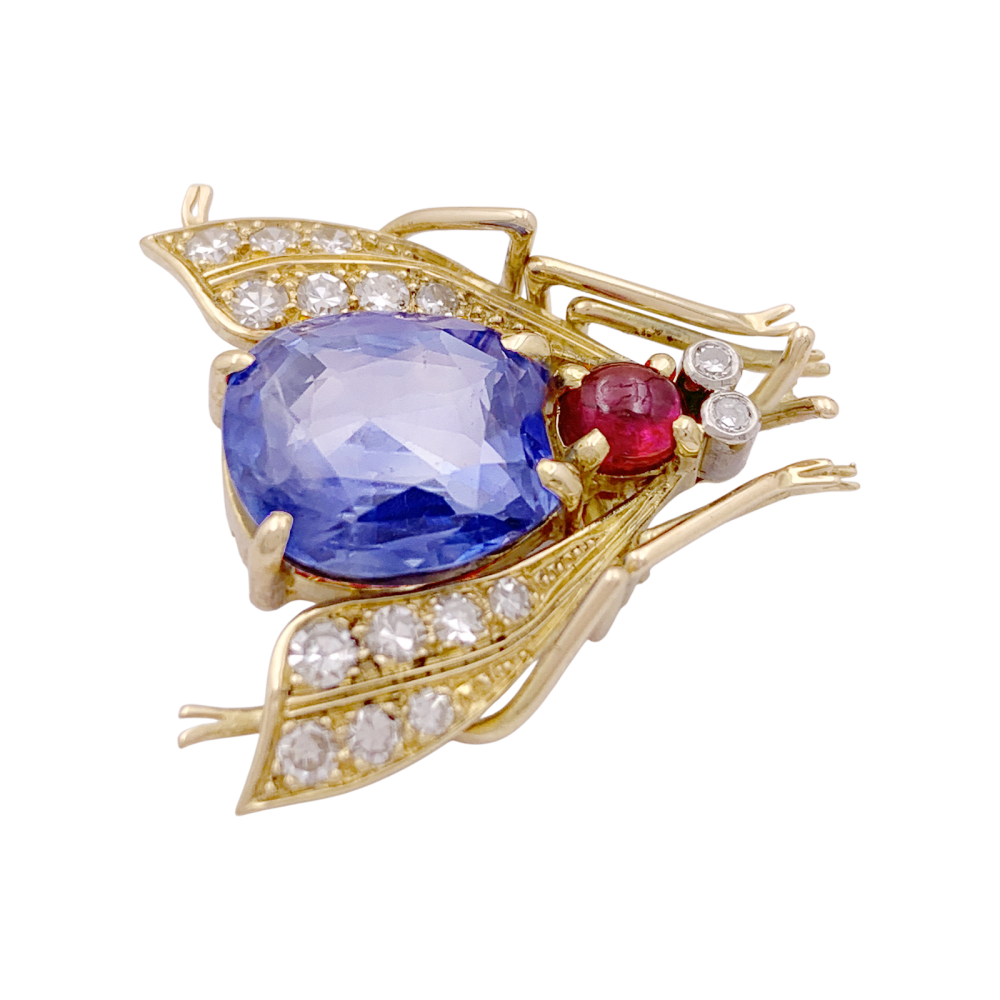 Broche Van Cleef & Arpels, « Abeille », platine, or jaune, saphir, rubis et diamants.