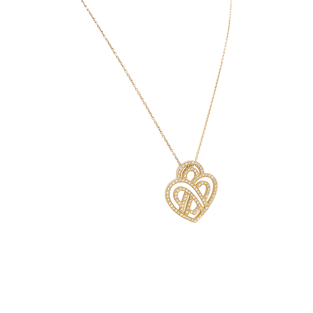 Collier Poiray, "Coeur entrelacé", or rose et diamants.