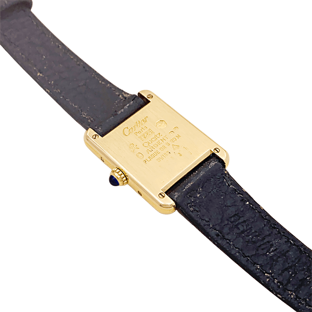 Montre Cartier, "Tank Must", argent plaqué or, cuir.