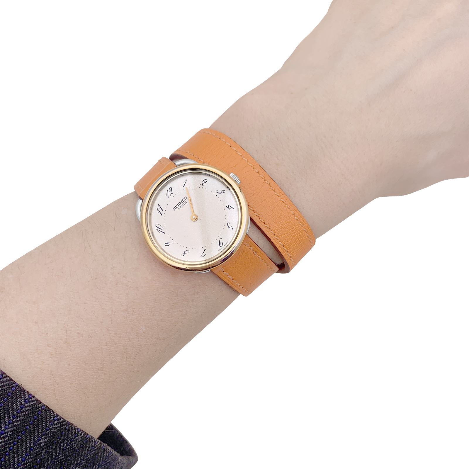 Montre Hermès, "Arceau", plaqué or, acier, cuir.