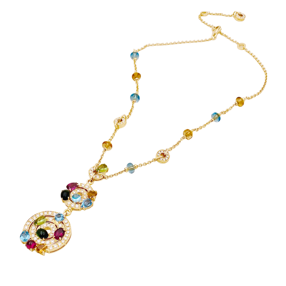 Collier BULGARI "Astrale", or jaune, diamants et pierres de couleur.