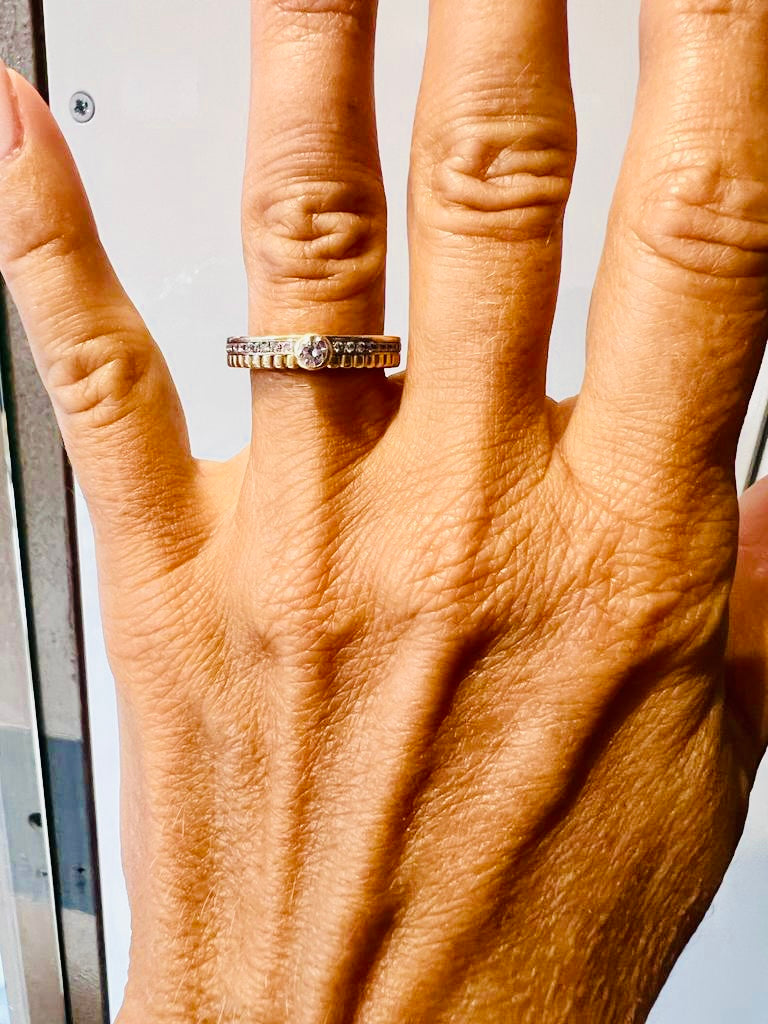 A "Quatre radiant" model ring in yellow gold from Boucheron