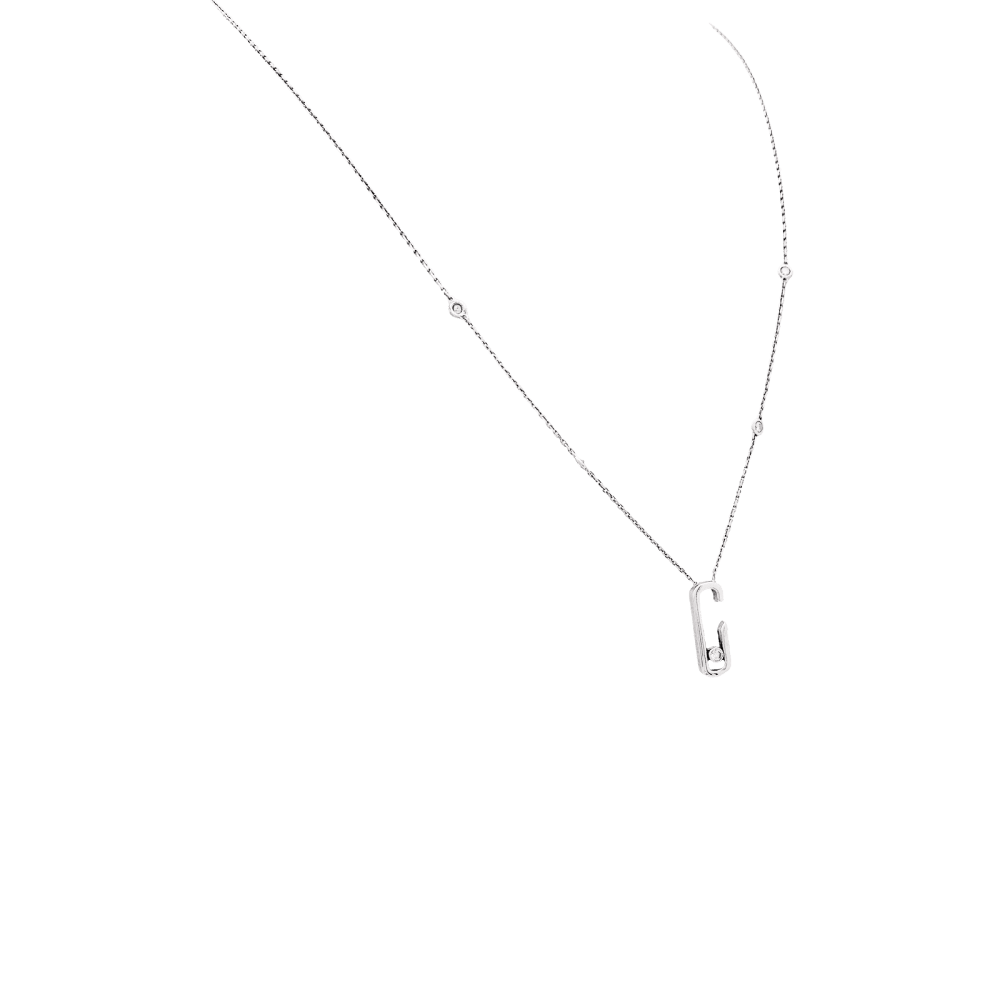 Collier Messika, "Move", or blanc et diamants.