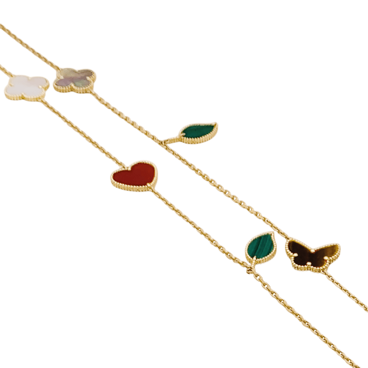 Collier - Sautoir Van Cleef & Arpels, "Lucky Alhambra", or jaune, cornaline, malachite, oeil de tigre, nacre. - Maison Eloe