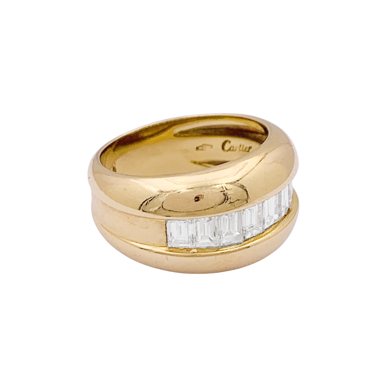 Bague Cartier, "Odin", or jaune, diamants taille émeraudes.
