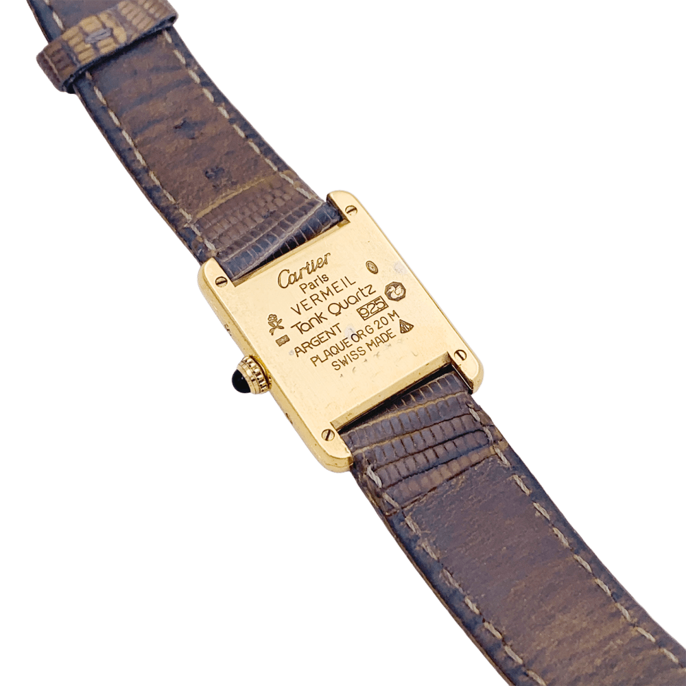 Montre Cartier, "Tank Must" argent plaqué or, cuir.