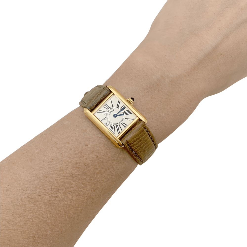 Montre Cartier, "Tank Must" argent plaqué or, cuir.