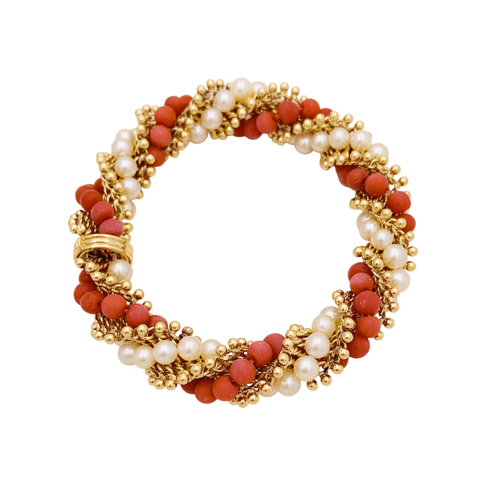 Bracelet Van Cleef & Arpels, "Twist", or jaune, corail, perles.