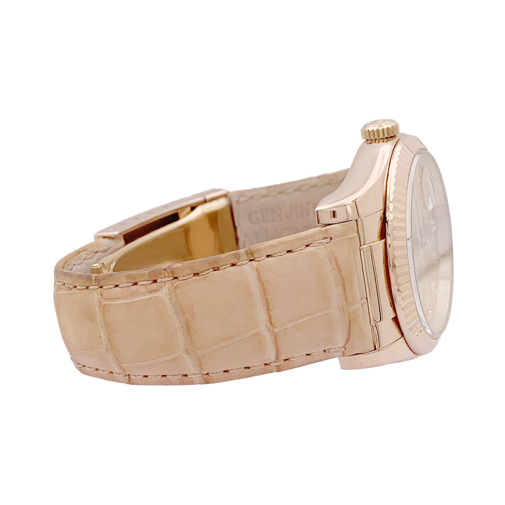 Montre Rolex, "Datejust" or rose, diamants, cuir.